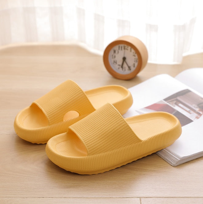 Light yellow foam flip flops