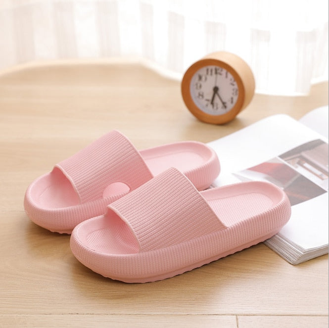 Light pink foam flip flops