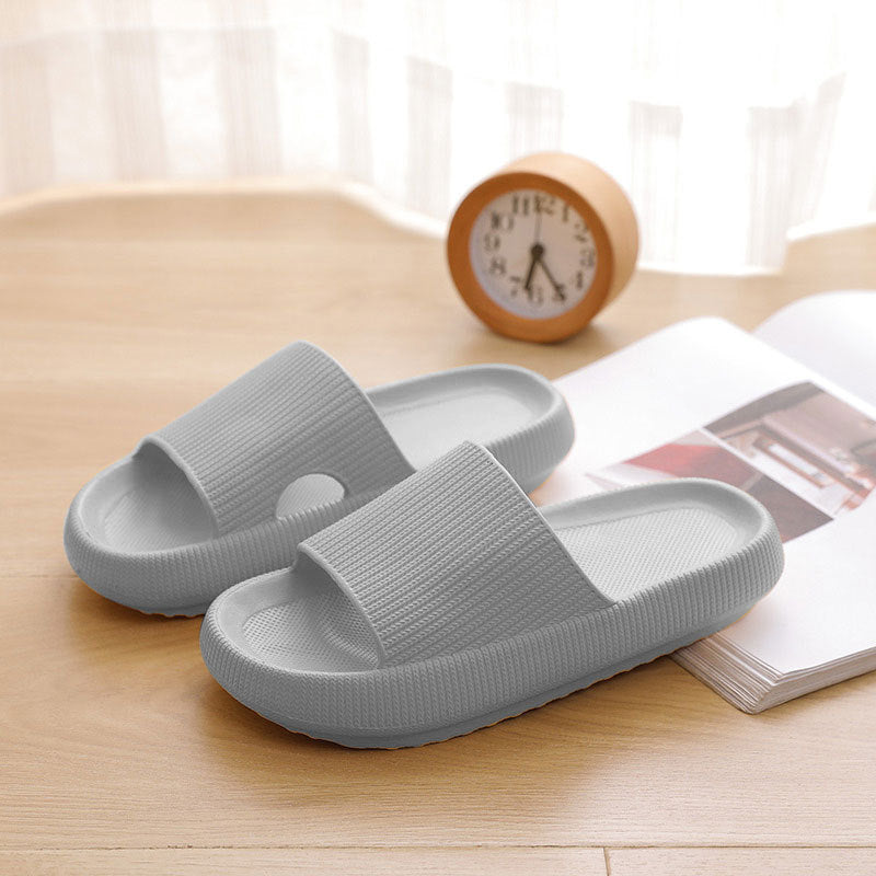 Light gray foam flip flops