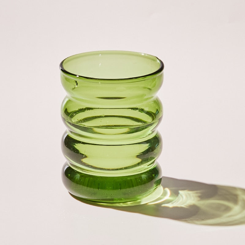 Green colored drinking glasses 