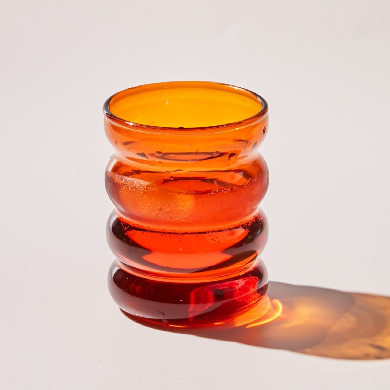 Orange colored drinking glass