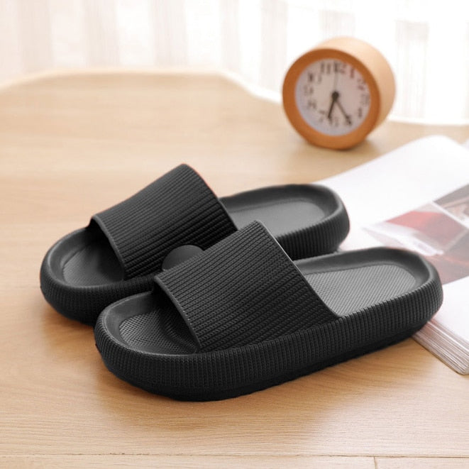 Black foam flip flops