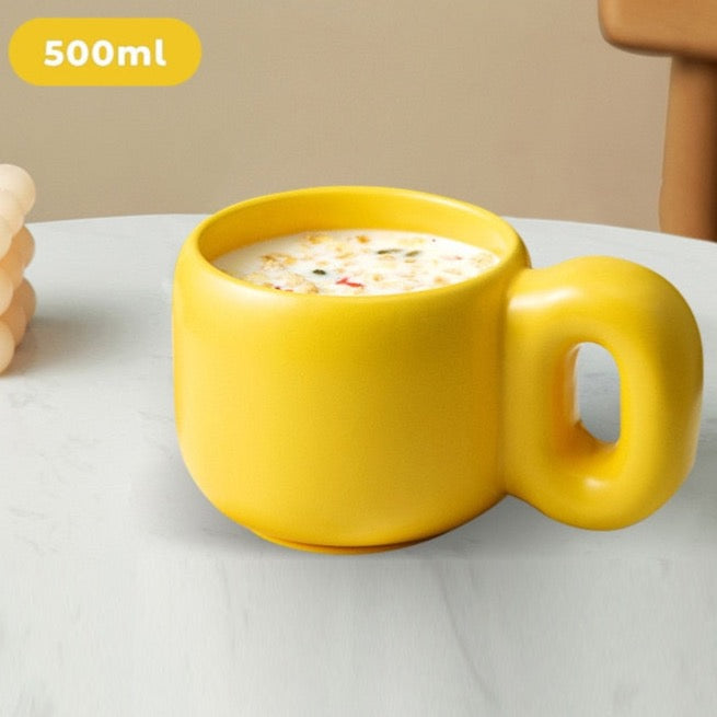 Yellow chunky handle ceramic mug